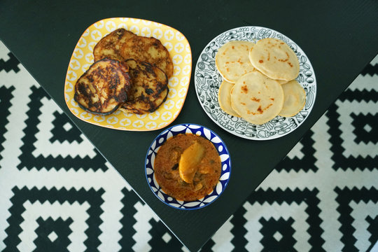 Traditional Malaysian pencake local called "lempeng" with chicken curry gravy