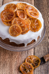 Citrus cake with lemon glaze and candied fruit slices