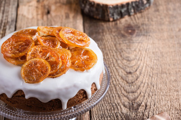 Citrus cake with lemon glaze and candied fruit slices