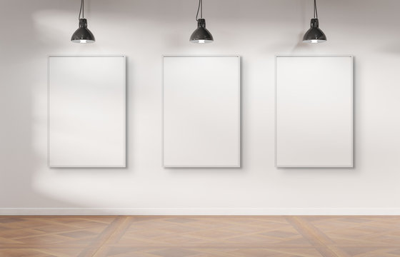 Three frames hanging on a wall mockup 3d rendering