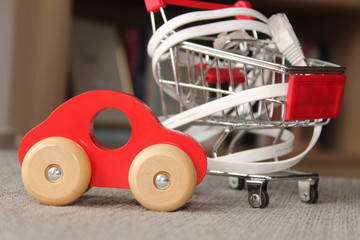 shopping cart with ethernet cable and car.