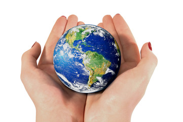 female hand with planet Earth