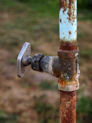 old rusty water tap
