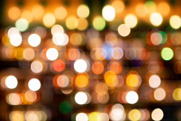 Abstract Gold, Red, Orange, Green Bokeh With Black Background. Shining And Blurred Circles, Background.