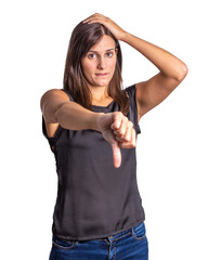 young woman made dislike gesture isolated on a white background