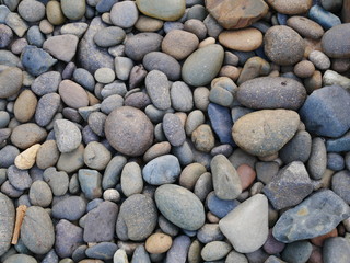 Fototapeta na wymiar pebbles on the beach,aroma stone background