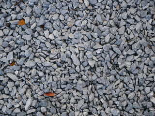 rock stone for asphalt pebbles on the beach