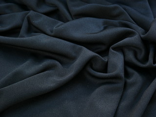 black fabric cloth background,texture of silk satin