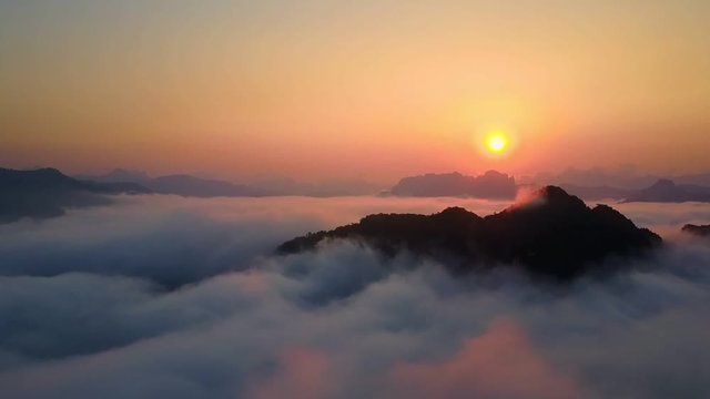 Drone Sunrise above the clouds liquid clouds