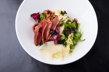 Elegant duck meat salad with caviar