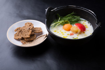 Seafood soup with croutons and pate