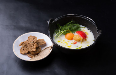 Seafood soup with croutons and pate