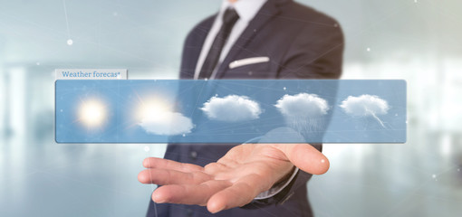 Businessman holding a Weather Forecast widget 3d rendering