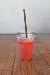 Strawberry smoothies on wooden tabel