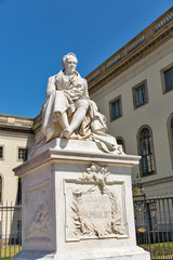 Fototapeta na wymiar Alexander Humboldt statue outside Humboldt University in Berlin, Germany.