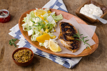 Fried chicken breast with spices
