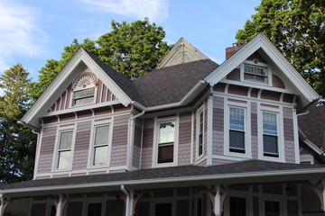 Fototapeta na wymiar Brightly colored new England historic Victorian house