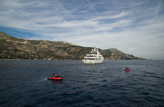 A luxury private motor yacht and two jetski