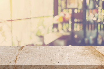 Empty stone marble and Blurred background : Coffee shop blur background bokeh with space display montage for product.