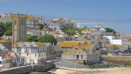 St Andrew's Parish Church, houses, and town in St Ives, Cornwall, England.