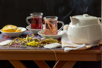 herbal teas in glass cups on table