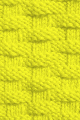 The texture of the knitted sample color Golden Lime . Fashionable palette of this season.