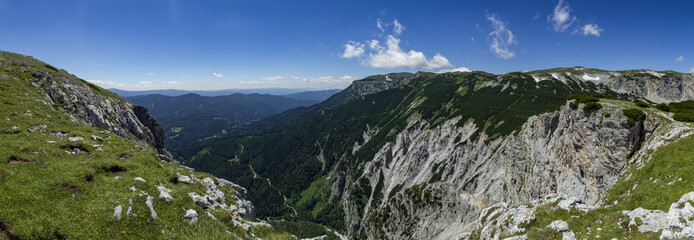 Fototapeta na wymiar A valley between mountain ridges in Rax Alps