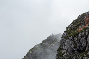 The corner of the cliff and a person