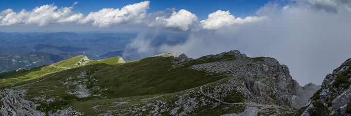 The corner of the cliff and a cloud