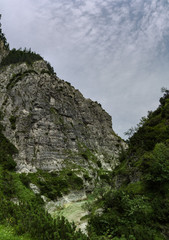 A valley between mountains with a small river