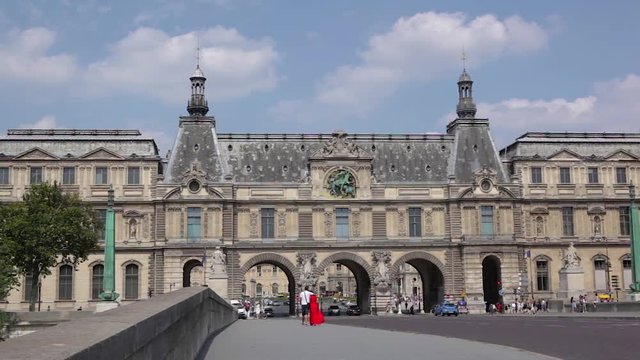 Paris, France - Couple in love walking towards historic building