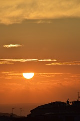Obraz premium Tramonto, estate e nuvole