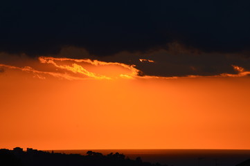 Fototapeta premium Tramonto, estate e nuvole