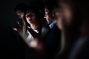 close up.image of colleagues with gadgets