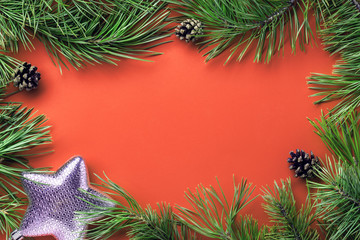 Christmas tree toy - star on a colored background top view with copy space. New Year, holiday, give. flatlay