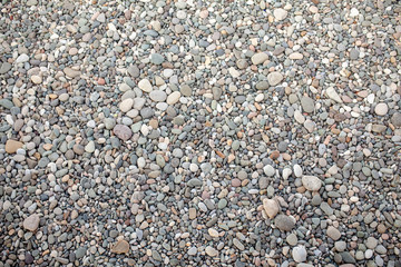 abstract background with dry round peeble stones. Sea stone close up