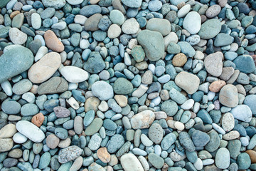 abstract background with dry round peeble stones. Sea stone close up