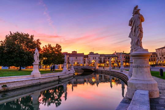 View of the canal with statues on Prato della Valle in Padova (Padua), Veneto, Italy