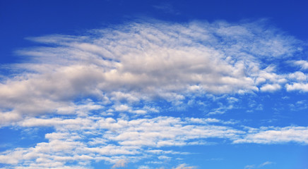 White clouds on the blue sky background