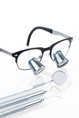 Dentist equipment tools for dental care on white background.- Image