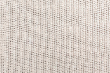 Knitted white sweater pattern background.