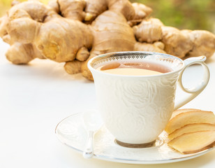 Ginger tea in a white cup.