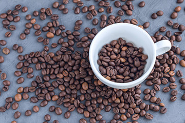 Coffee white cup with coffee beans