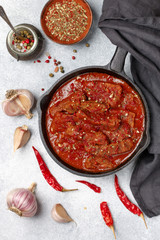 Meat (Beef) stewed in tomato sauce with garlic and spices. Goulash. Delicious hearty dinner for gourmets. Selective focus