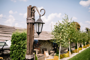 ancient metal street lamp on the facade