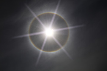 Fantastic beautiful sun halo phenomenon , sun shine with rainbow circular