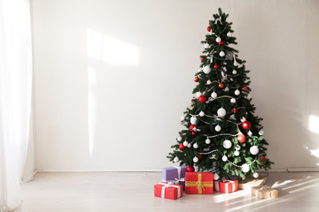 Fototapeta na wymiar Christmas background Interior new year tree gifts winter postcard