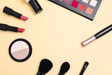 Professional makeup products with cosmetic beauty products, foundation, lipstick,  eye shadows, eye lashes, brushes and tools.