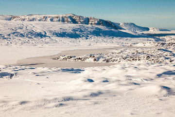 Fototapeta na wymiar Beautiful and dangerous driving road in winter snow Iceland