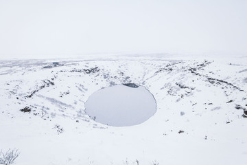 Kerid volcano crater during winter snow in Iceland